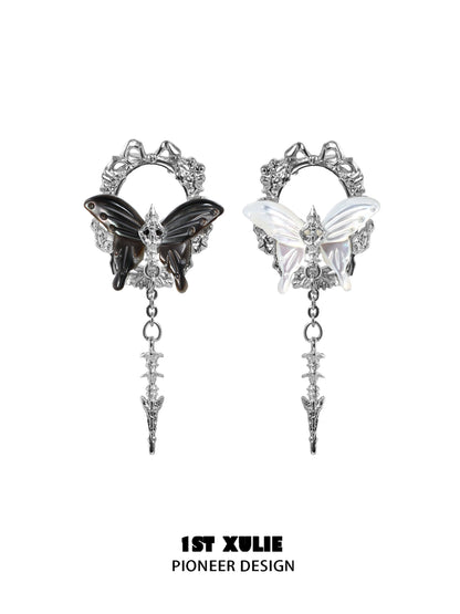 Stylish cyber butterfly earrings featuring black and white butterflies with intricate designs