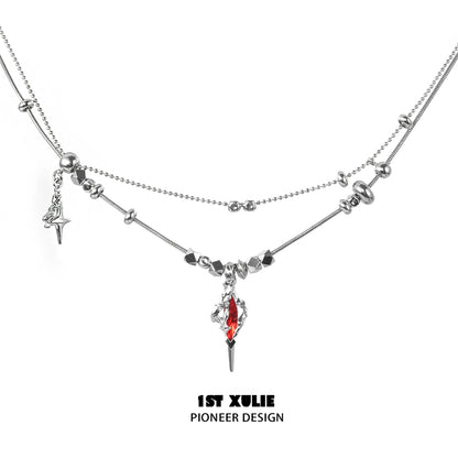 1STXULIE dark dreamcore necklace featuring silver chains and a red crystal pendant