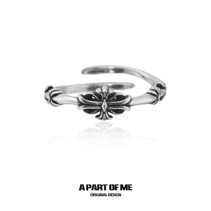 A PART OF ME dark iris vintage ring with intricate floral design in polished silver tone