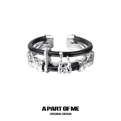 A PART OF ME dark matter leather ring featuring a unique textured design and adjustable fit