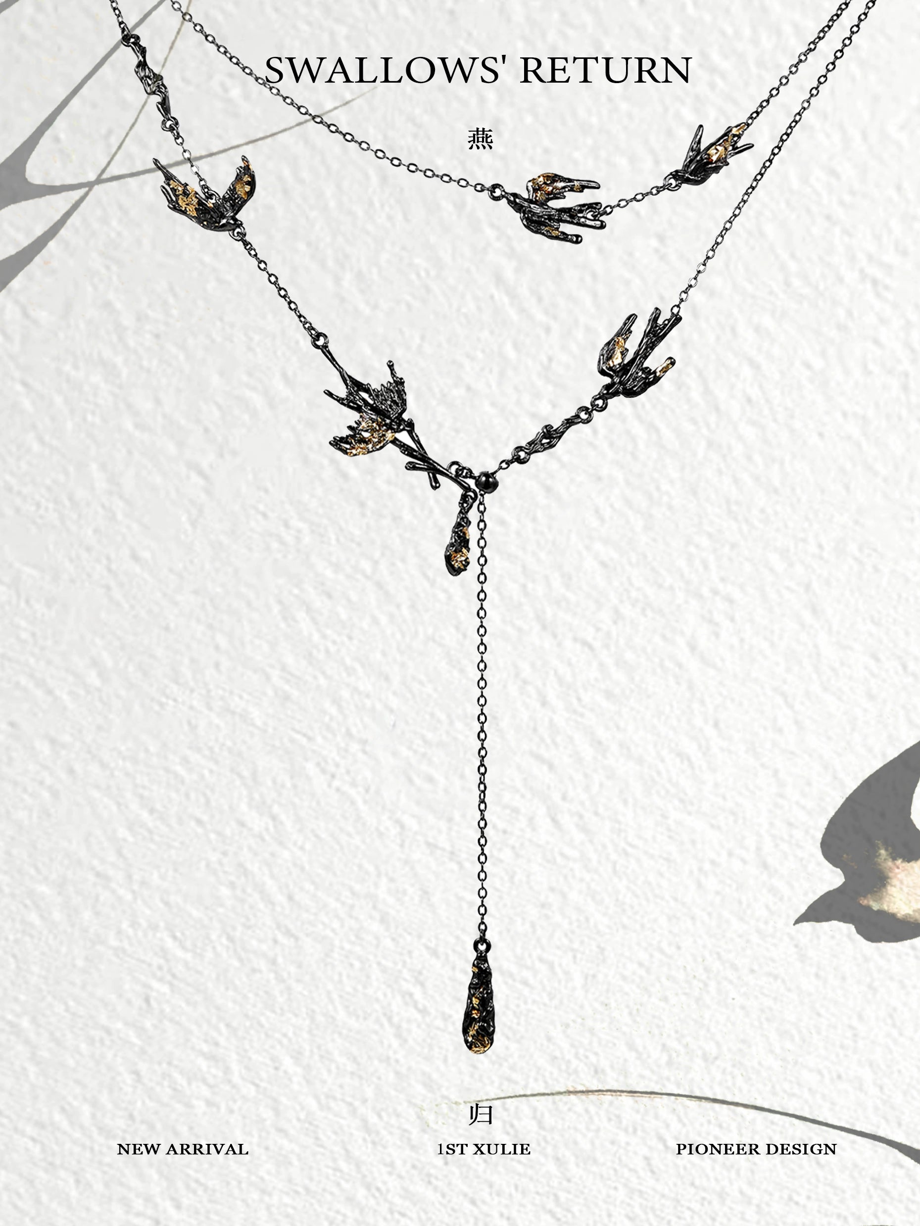Dark swallow necklace featuring elegant design with multiple swallows and a hanging drop detail