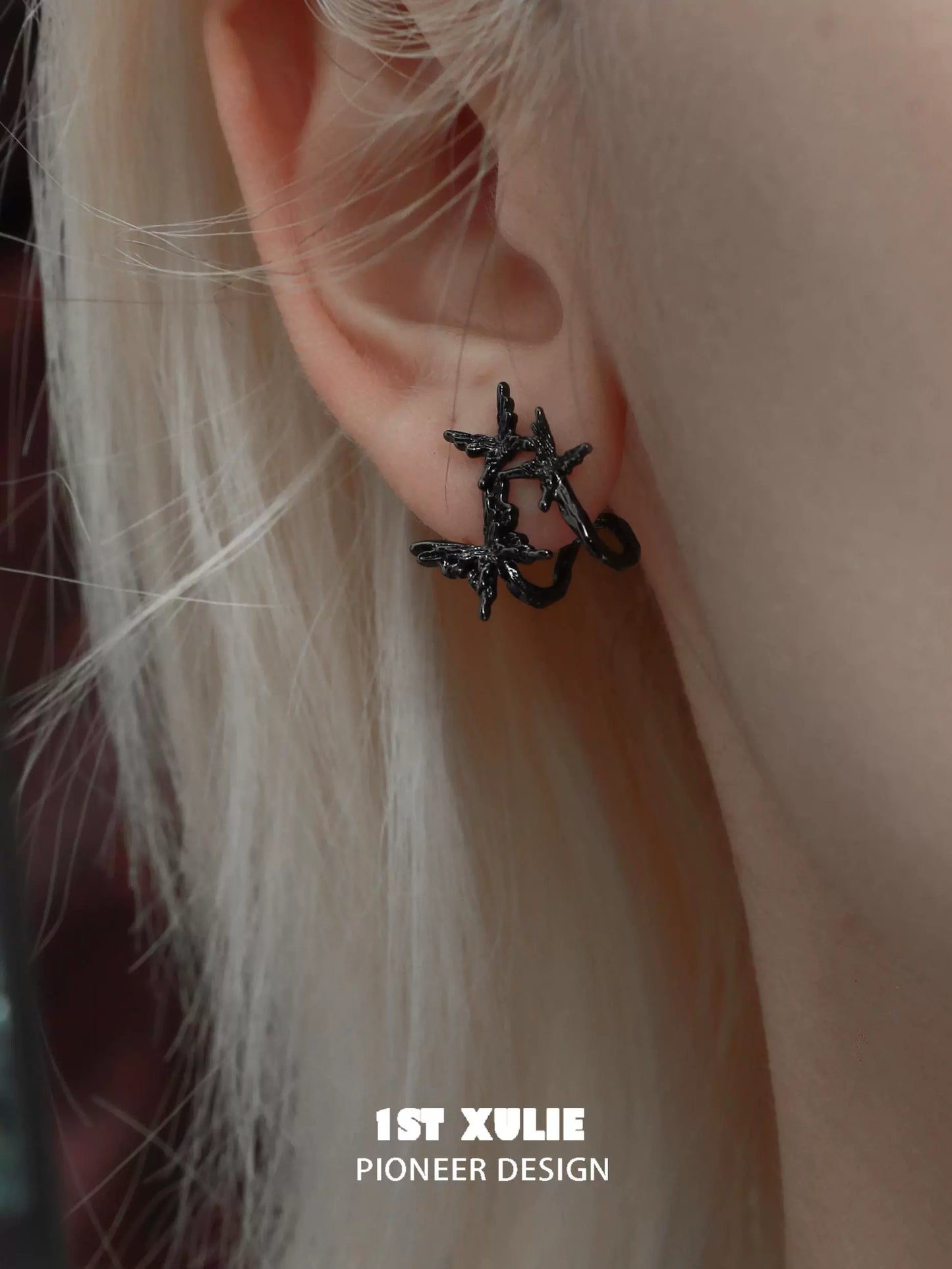 Dark thorn butterfly earrings featuring an intricate design for a unique fashion statement