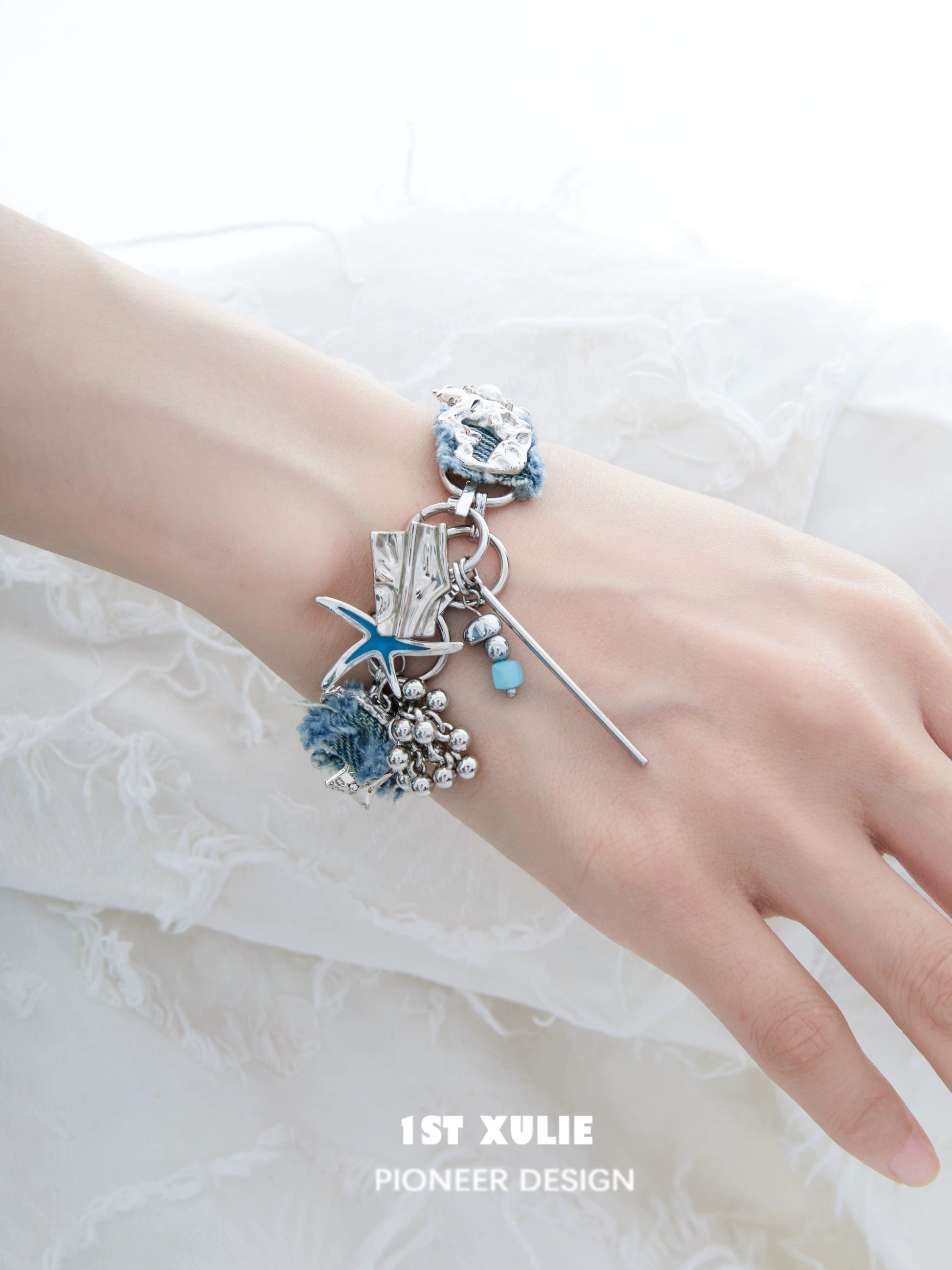 Denim star choker necklace featuring a unique design with silver accents and floral details
