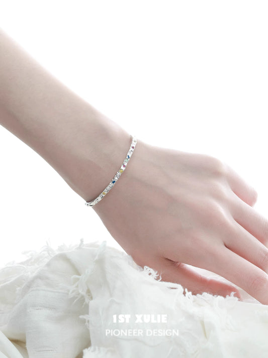 Dopamine color zircon bracelet displayed on a wrist with a delicate design