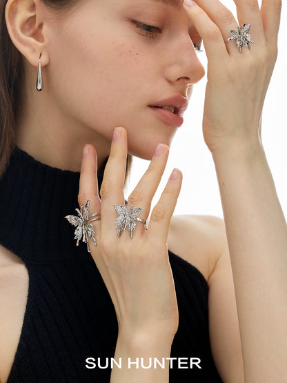 Model wearing a SUN HUNTER double-layer butterfly ring with elegant design and sparkling details