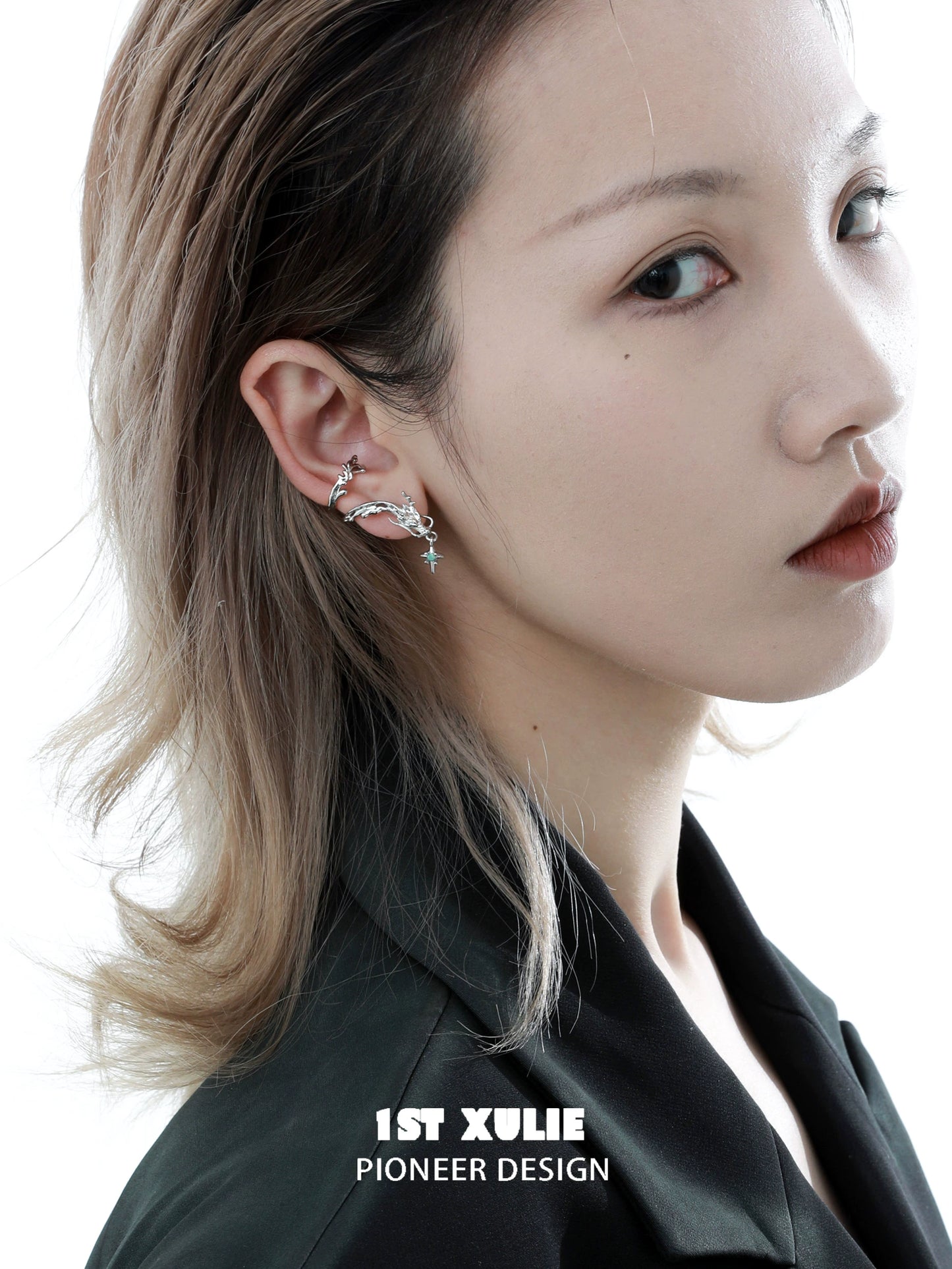 Model wearing 1ST XULIE dragon ear cuff jewelry with unique design and elegant details