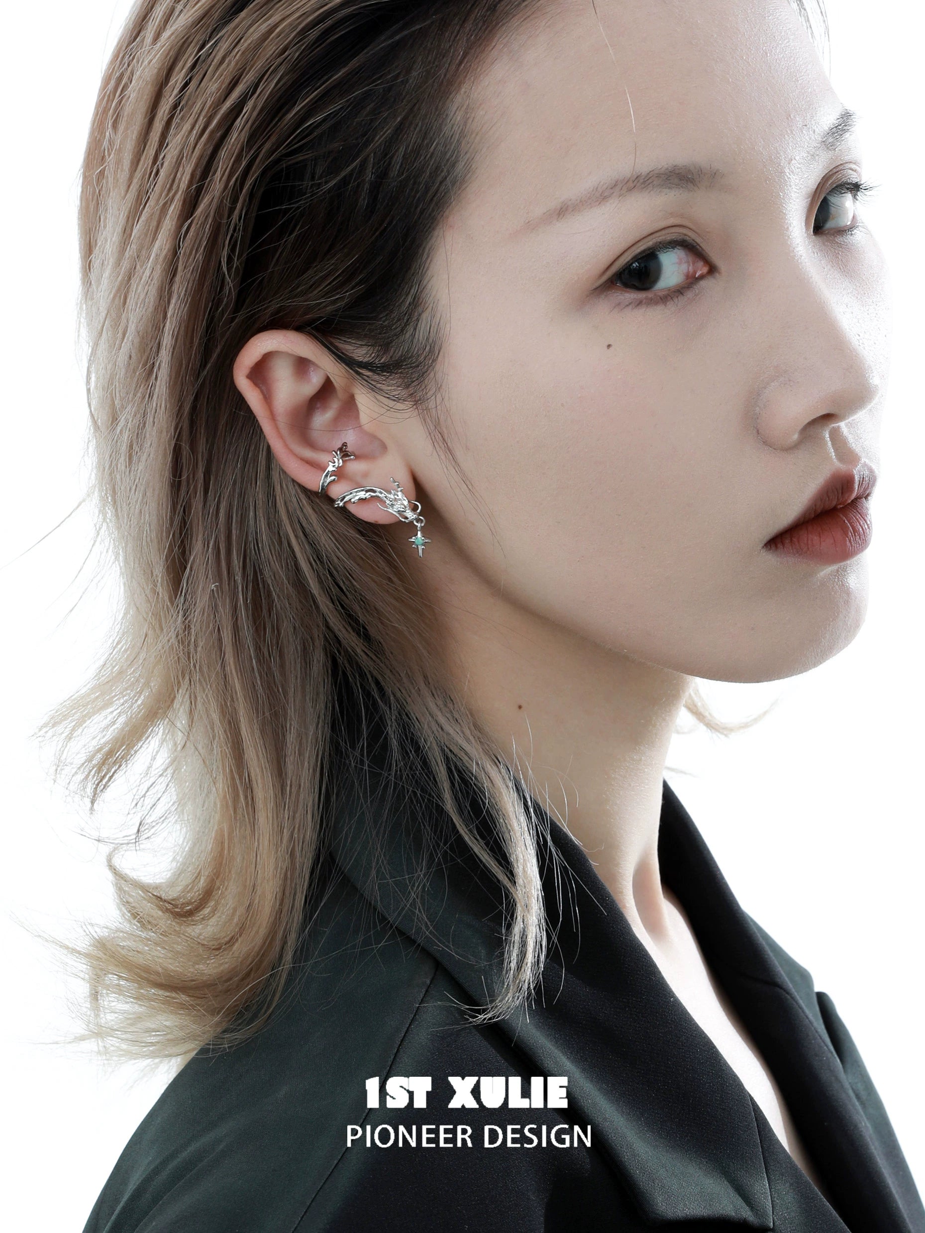 Model wearing 1ST XULIE dragon ear cuff jewelry with unique design and elegant details