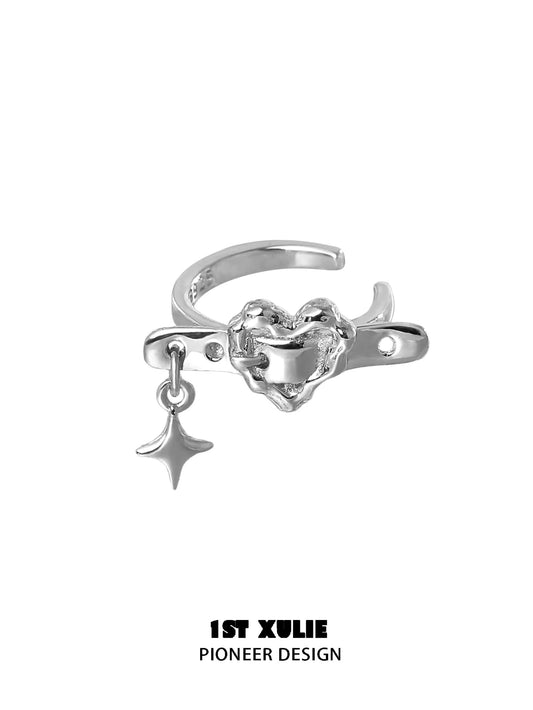 Silver edgy heart ear cuff with a star charm for a trendy accessory look