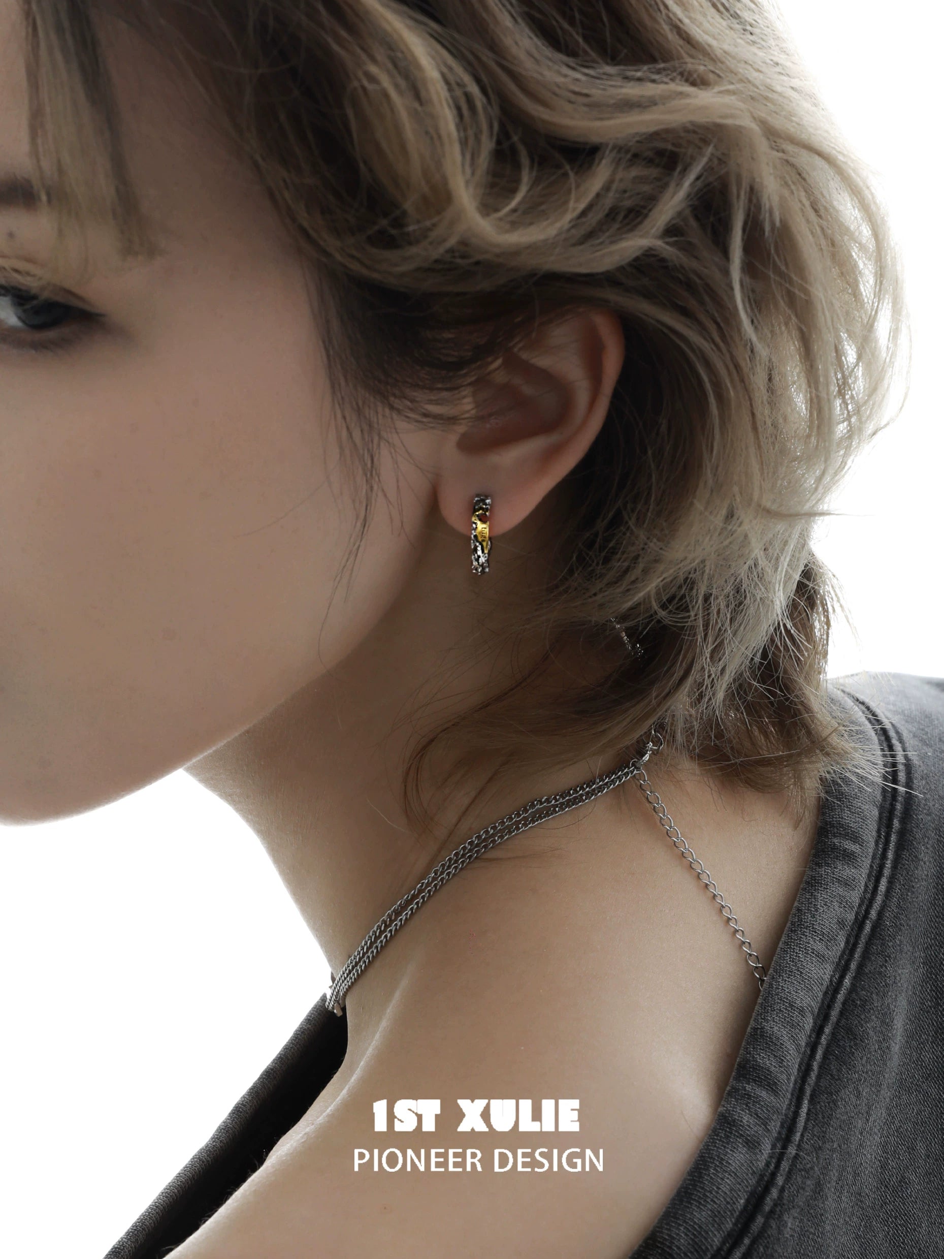 Edgy love letter earrings in a stylish design, perfect for adding flair to any outfit