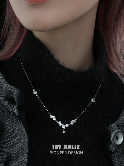Edgy zircon necklace on a model, featuring a unique design with sparkling stones for a modern look