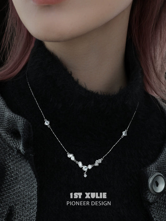 Edgy zircon necklace on a model, featuring a unique design with sparkling stones for a modern look