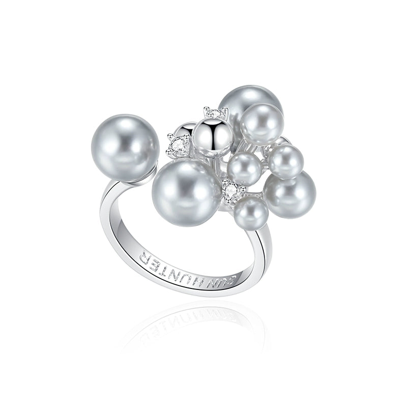 SUN HUNTER elegant pearl statement ring featuring multiple lustrous pearls and sparkling accents