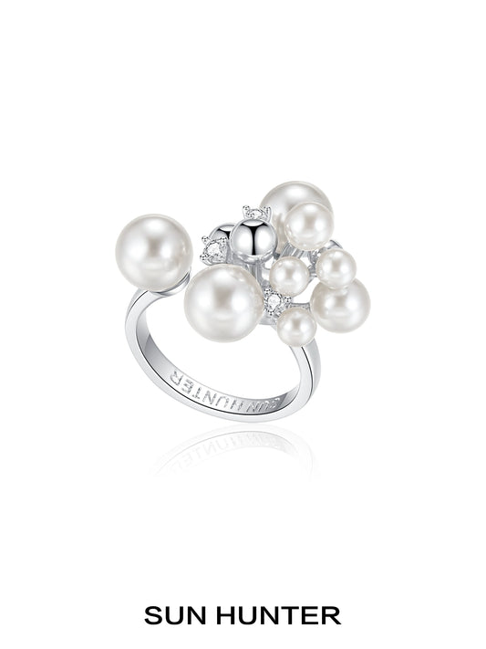 SUN HUNTER elegant pearl statement ring featuring multiple lustrous pearls and sparkling accents