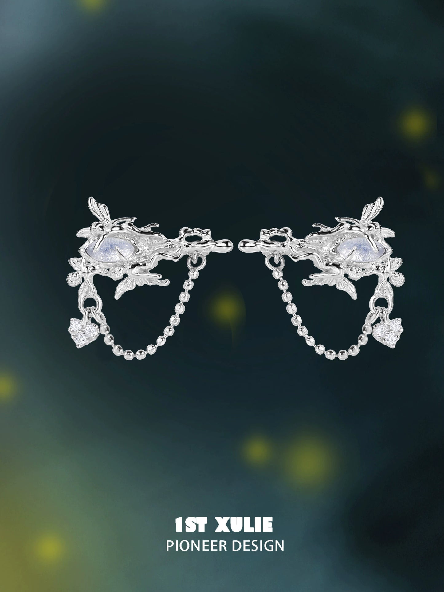 Silver elf opal earrings featuring intricate design with sparkling accents and unique chain details