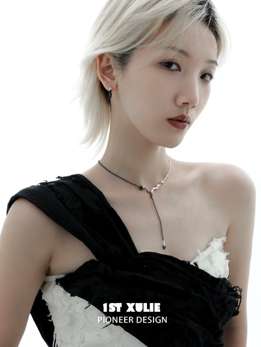 Stylish model wearing an Eternal Flame couple necklace with unique design for romantic couples