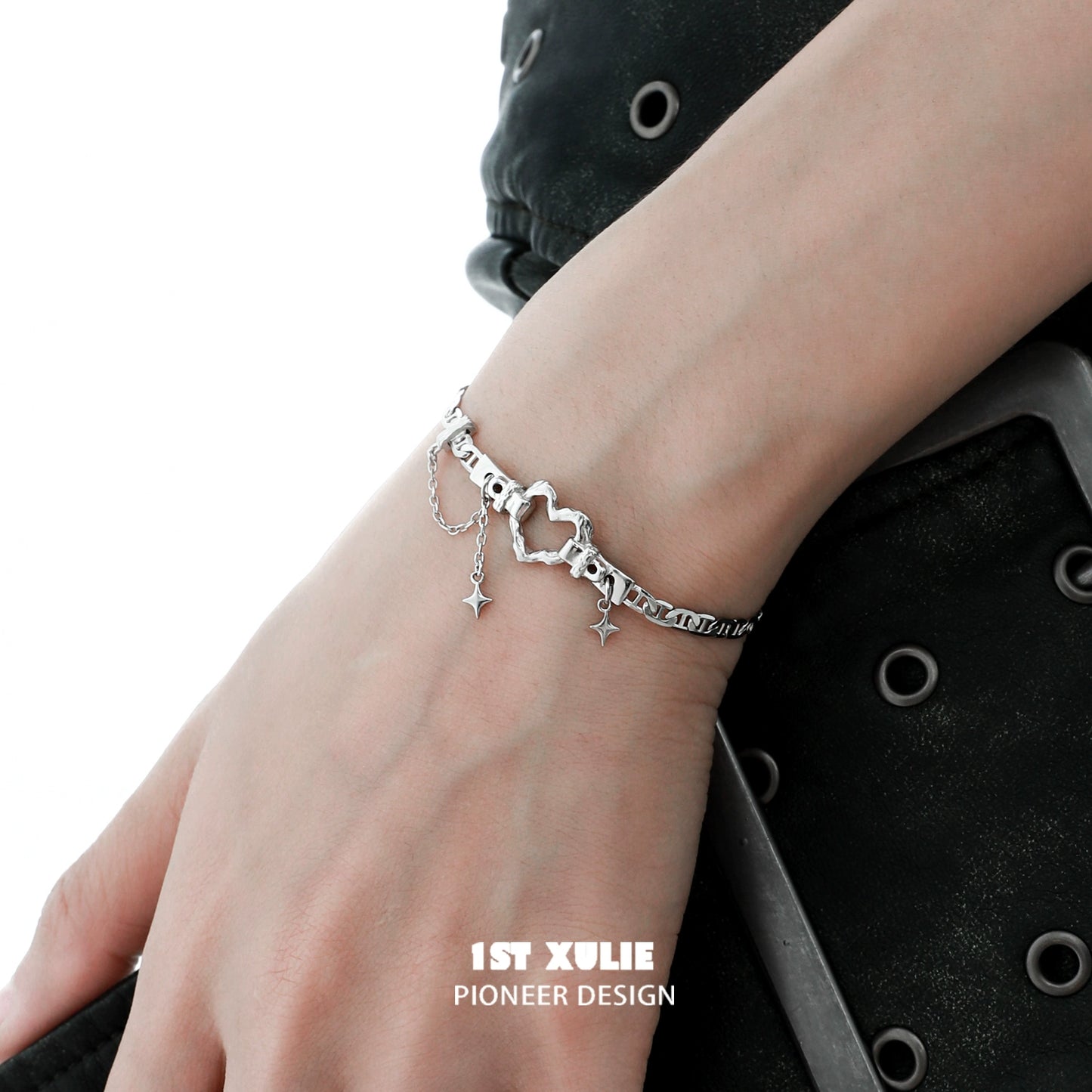 Eternal love heart silver bracelet featuring a unique design with dangling stars and a heart charm