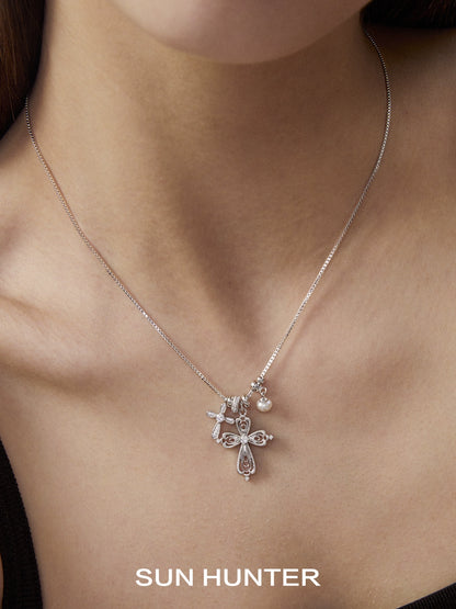 SUN HUNTER faith charm necklace featuring a delicate design with sparkling embellishments