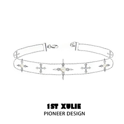 Faithful rose cross necklace featuring delicate silver chains with decorative cross charms