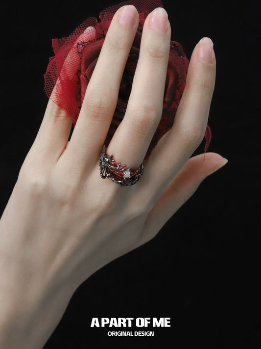 Elegant feather agate ring by A PART OF ME showcased on a hand holding a red rose