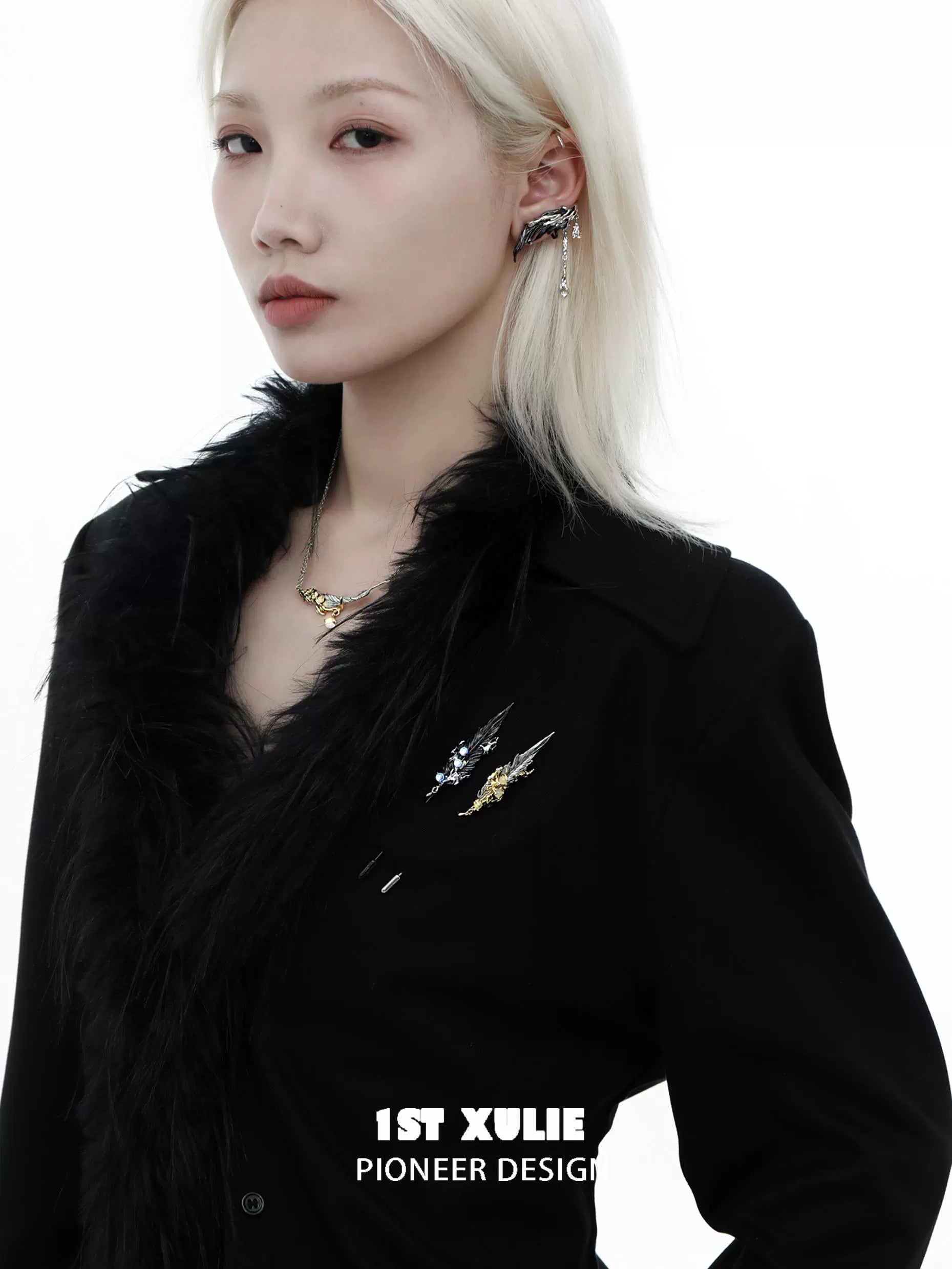 Elegant 1ST XULIE feather couple brooch set, showcasing unique feather designs for stylish outfits