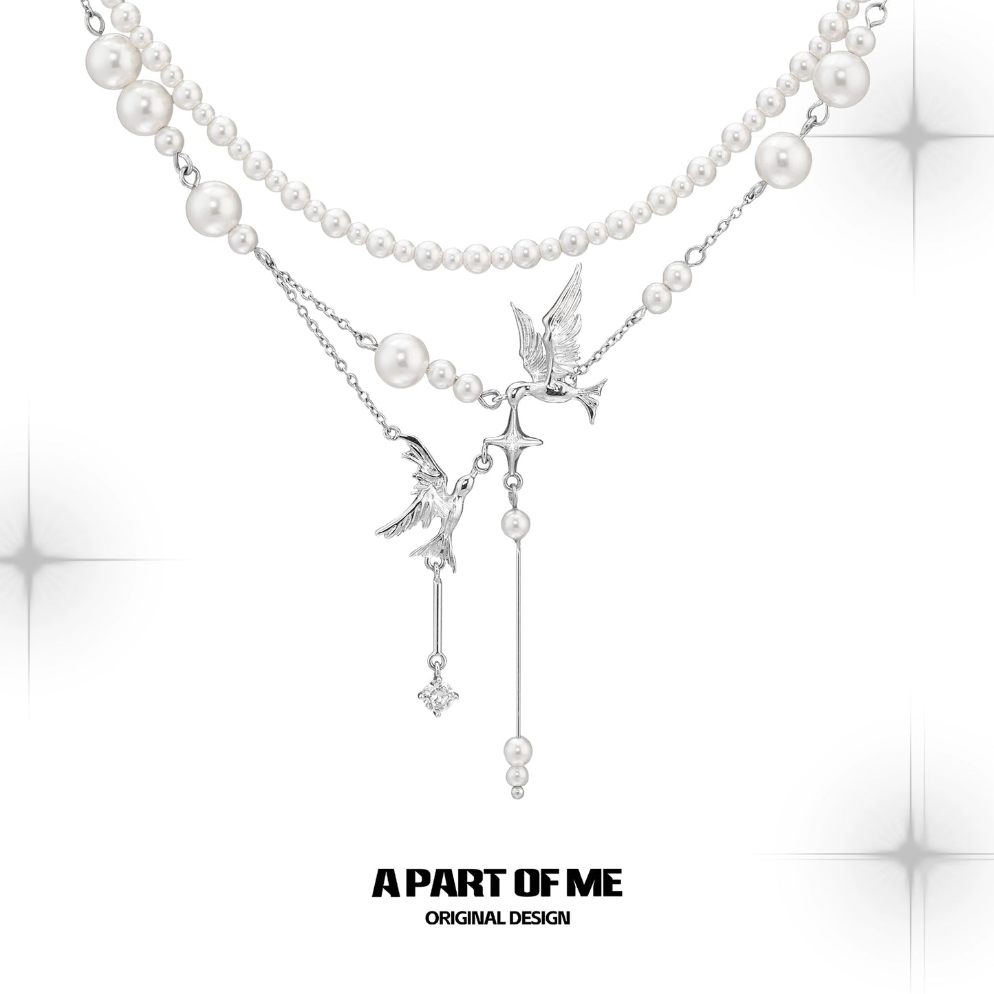 A PART OF ME flying bird pearl necklace featuring elegant bird charms and lustrous pearls
