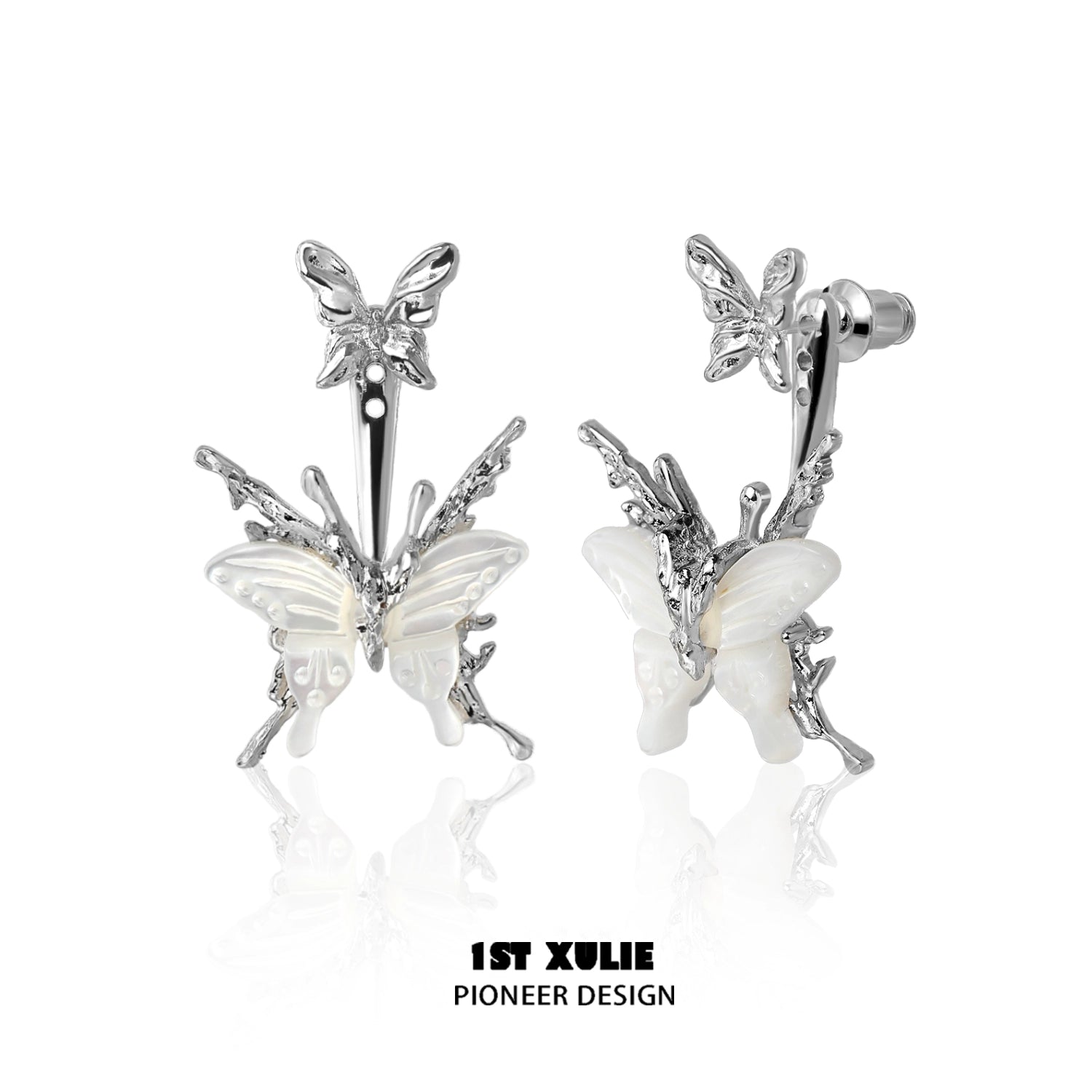 Futuristic butterfly earrings in silver with intricate design and detailed wings for a trendy look