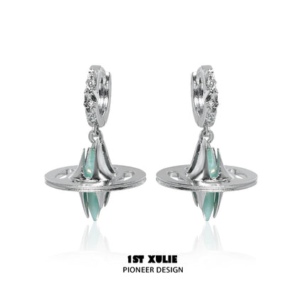 Futuristic dream core earrings by 1ST XULIE featuring silver design and teal accents