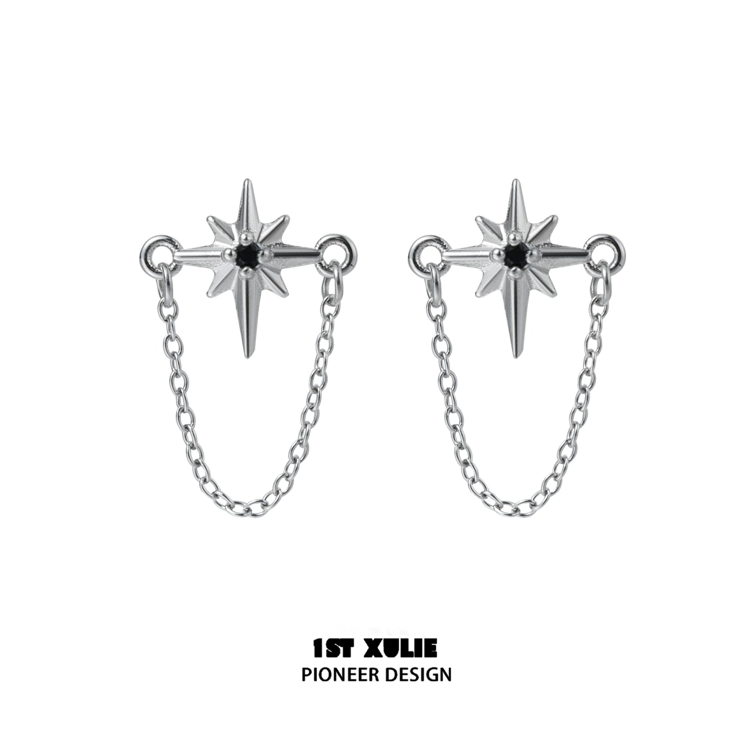Futuristic star chain earrings in silver with striking star design and connecting chain