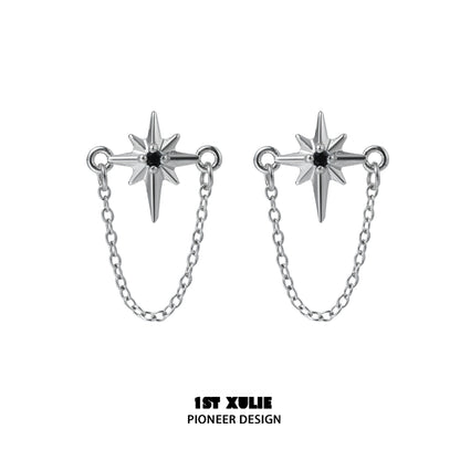 Futuristic star chain earrings in silver with striking star design and connecting chain