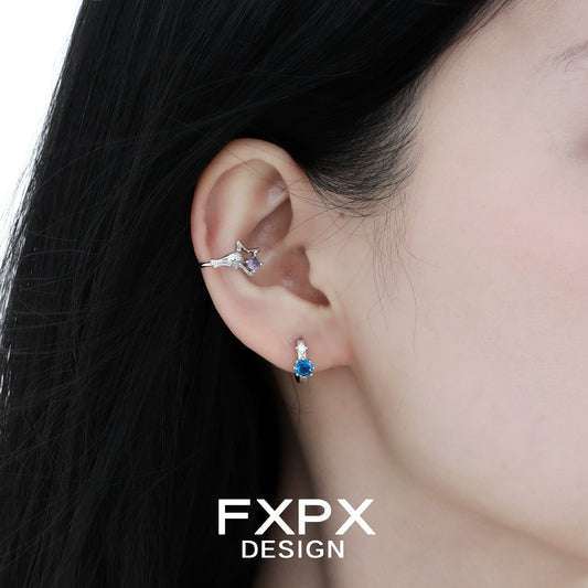 Stylish FXPX amethyst hand ear cuff worn elegantly on a woman's ear