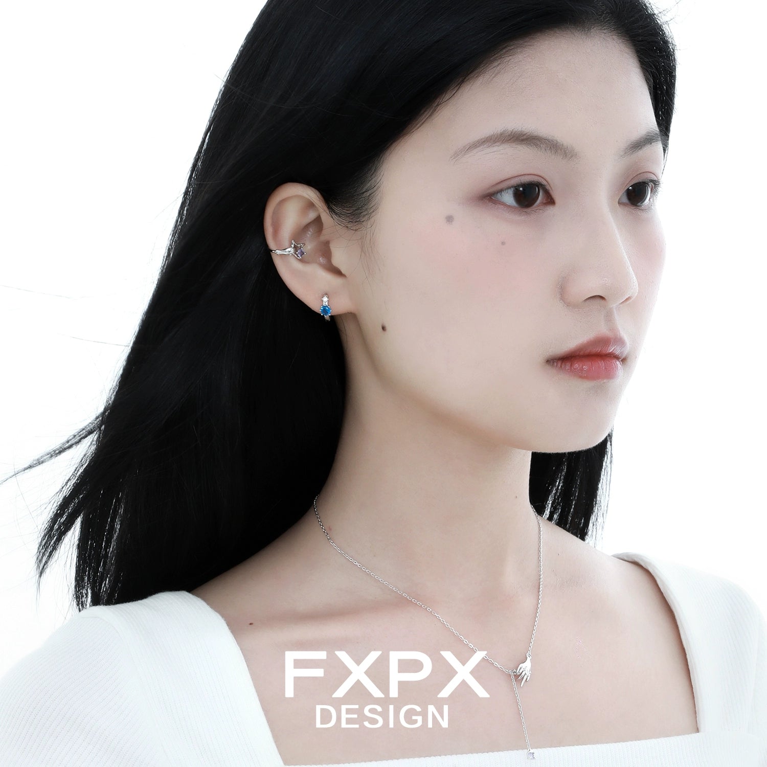 Elegant amethyst hand ear cuff from FXPX displayed on a model's ear with sleek hairstyle