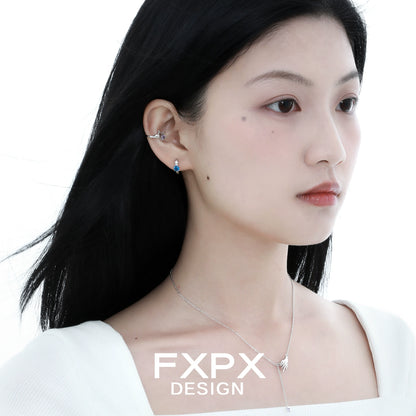 Elegant amethyst hand ear cuff from FXPX displayed on a model's ear with sleek hairstyle