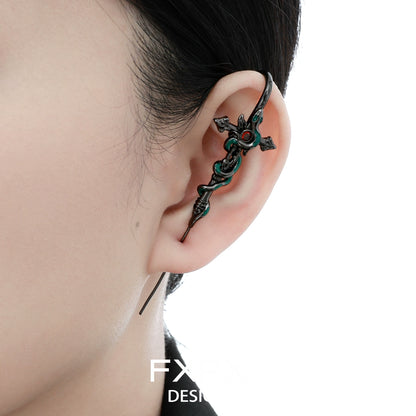 Bloody doll jewelry gothic snake pierced earrings worn on ear with black and red ornate design