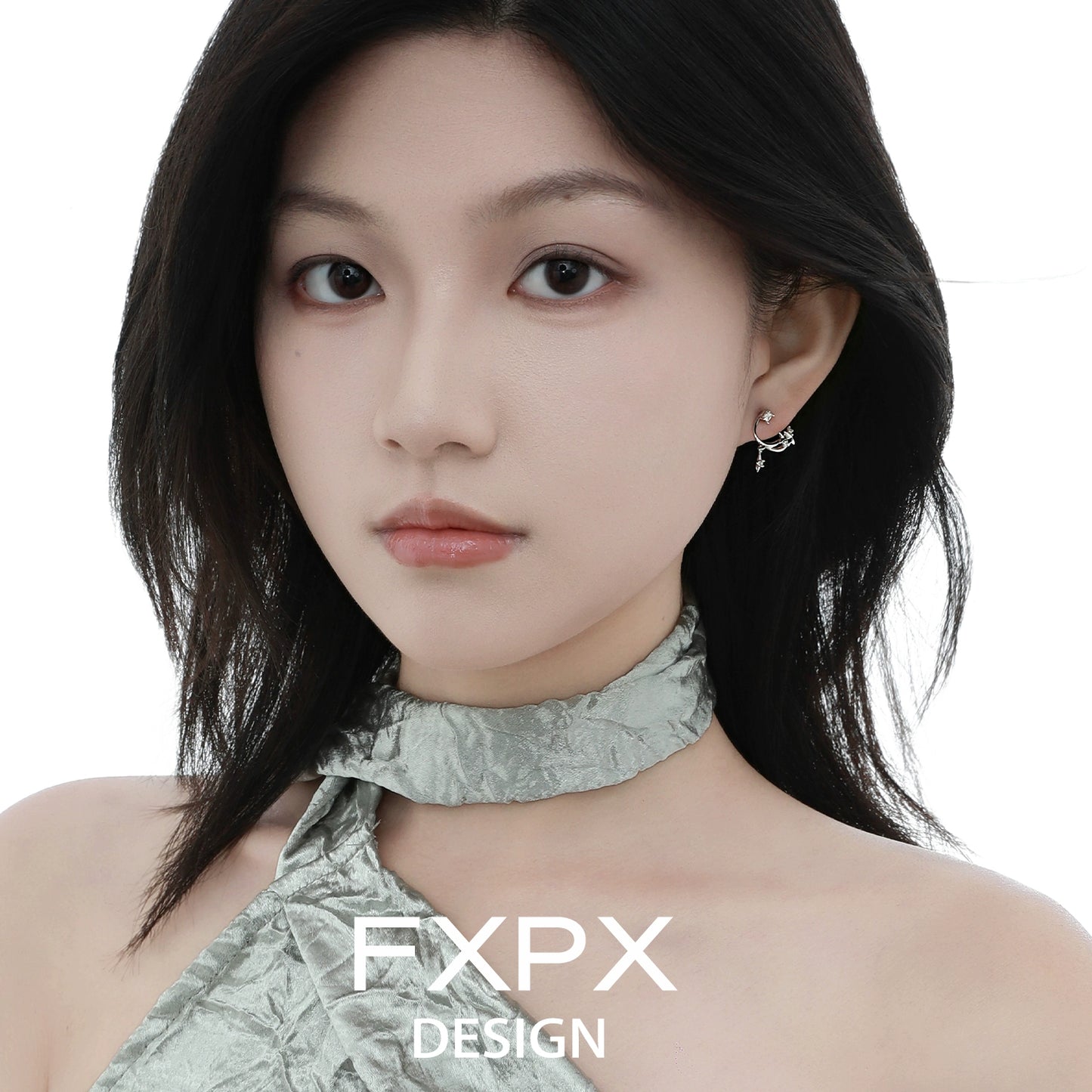 Woman wearing bloody doll jewelry silver star constellation stud earrings with delicate design