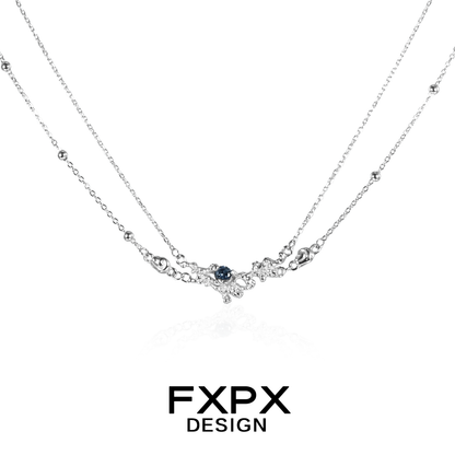Elegant FXPX blue crystal necklace with a layered silver design and delicate detailing