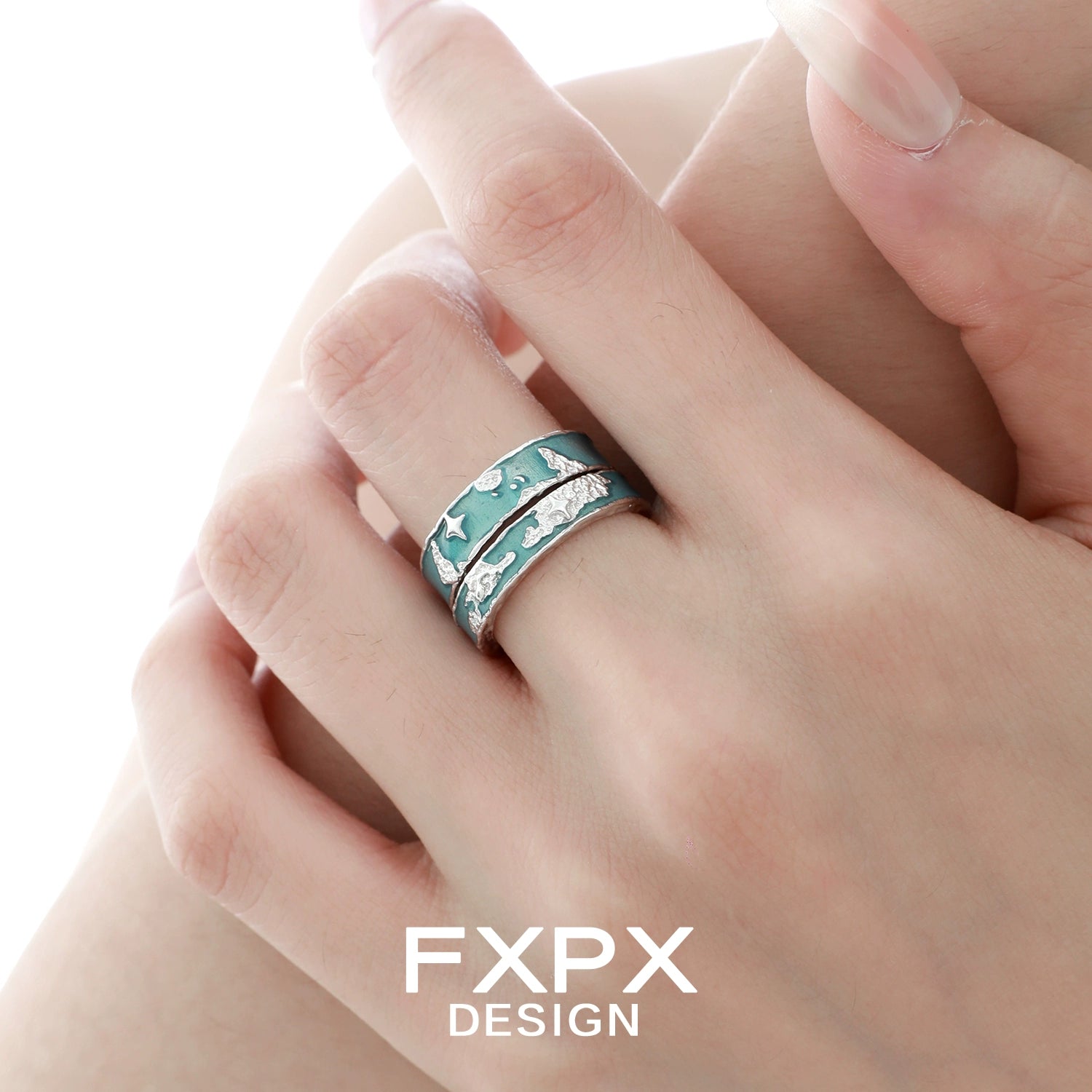 Stylish blue planet puzzle ring by FXPX featuring unique ocean-themed design