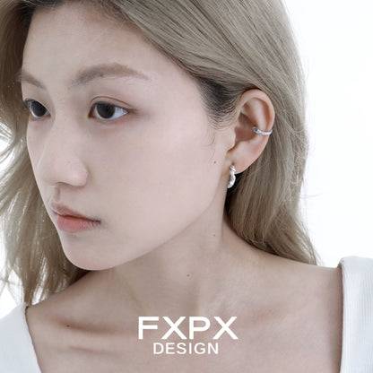 Elegant blue snake ear cuff by FXPX, adding a unique touch to your ear jewelry collection