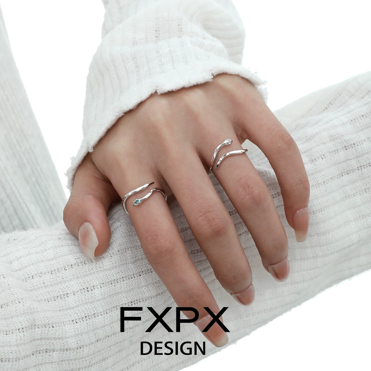 Elegant blue white snake ring crafted in silver, perfect for fashion-forward jewelry lovers