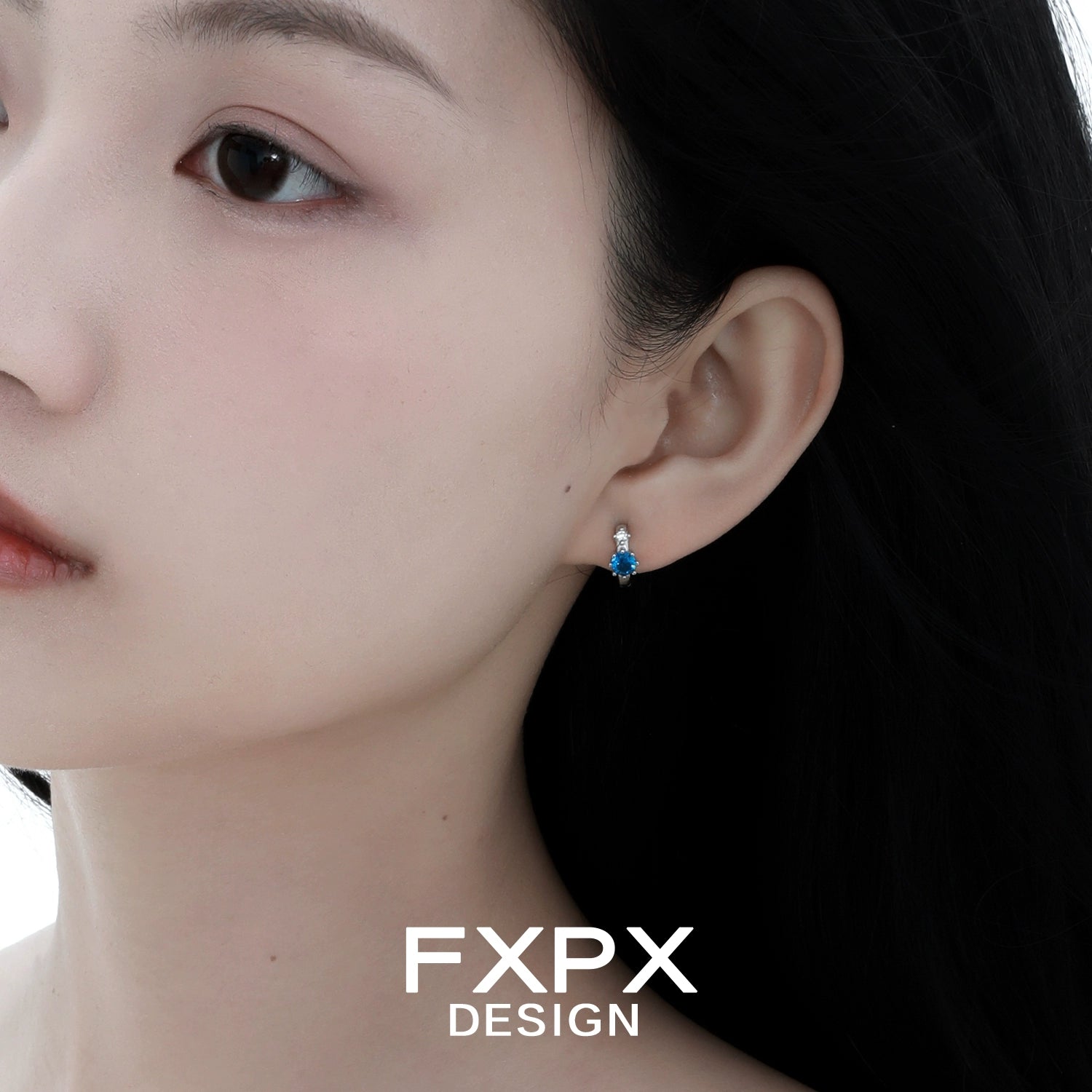 Elegant blue zircon earrings set in silver, perfect for formal occasions and everyday wear