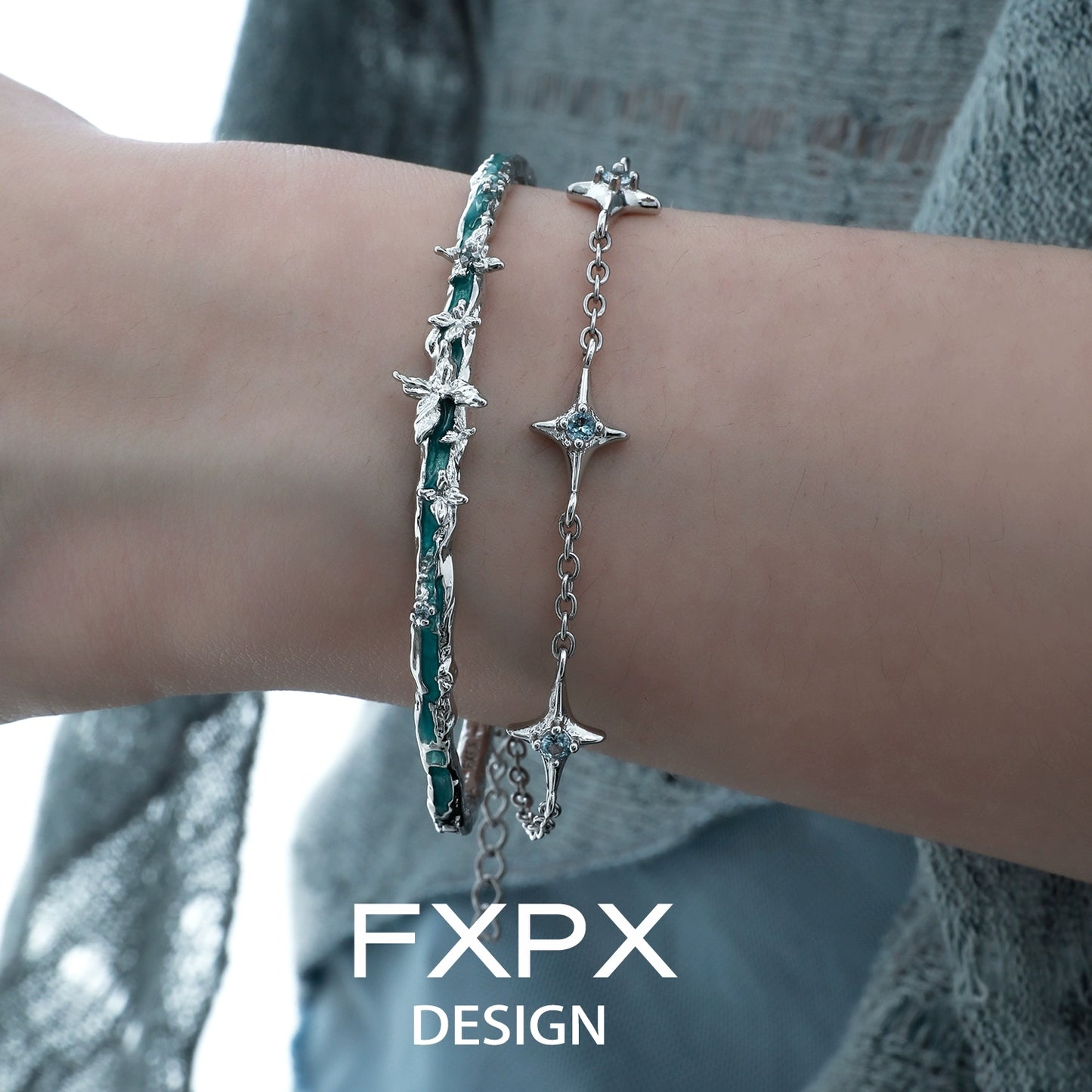 FXPX butterfly double layer bracelet featuring intricate designs in silver and teal for stylish layering