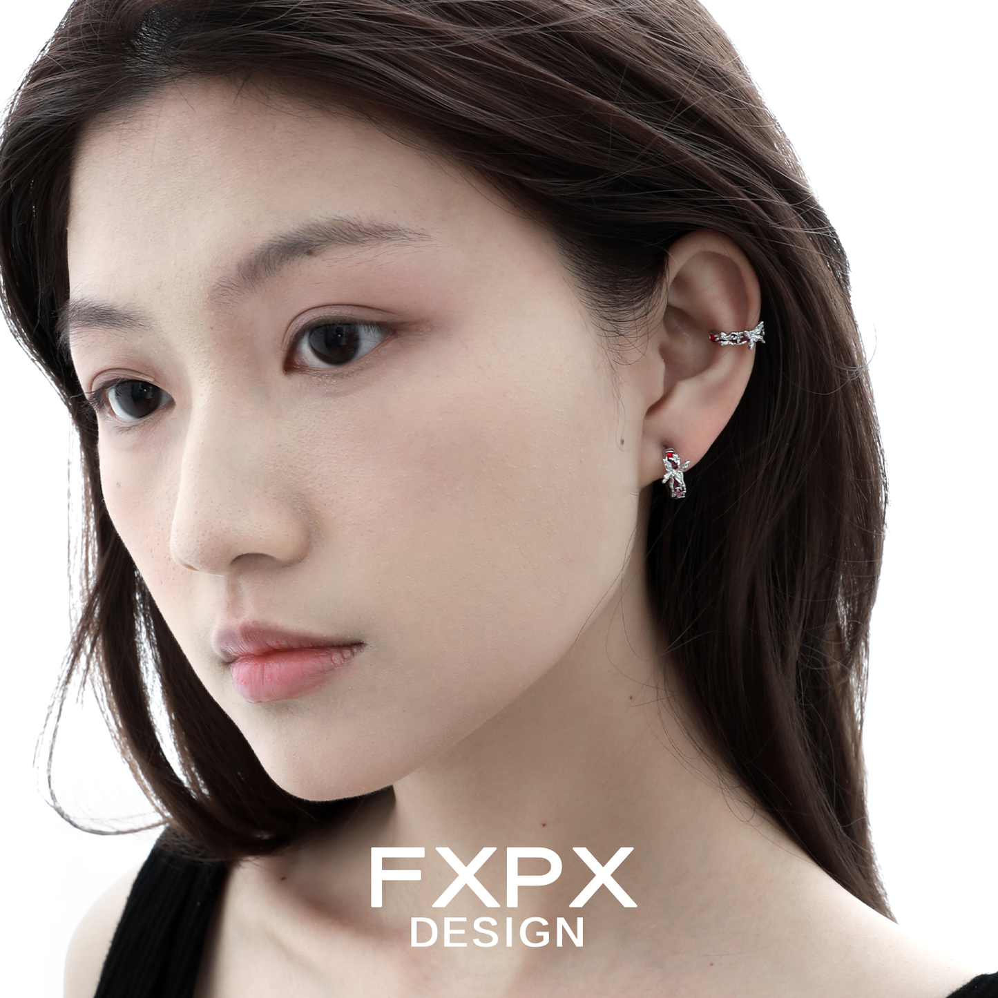 Elegant FXPX butterfly hoop earrings featuring a unique design, perfect for stylish outfits