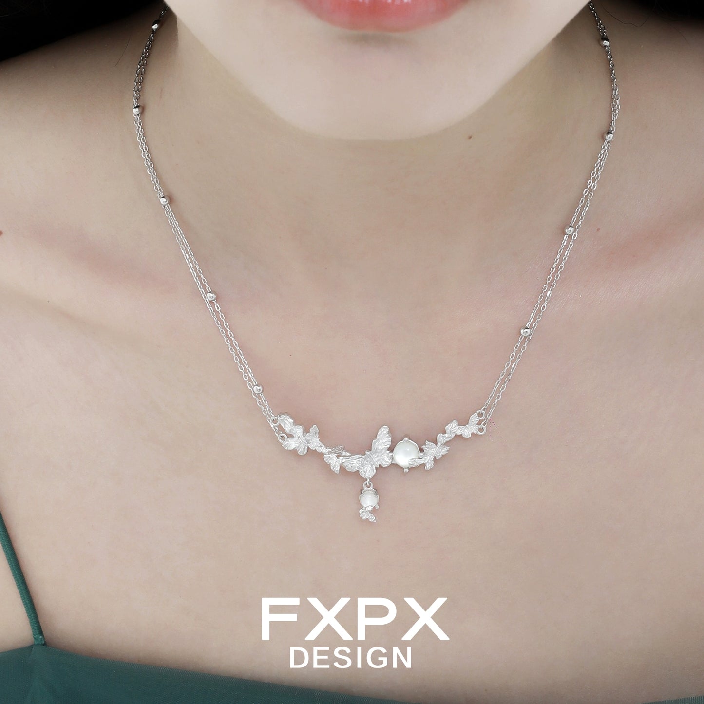 Elegant FXPX butterfly necklace for women featuring a delicate floral design and shimmering details