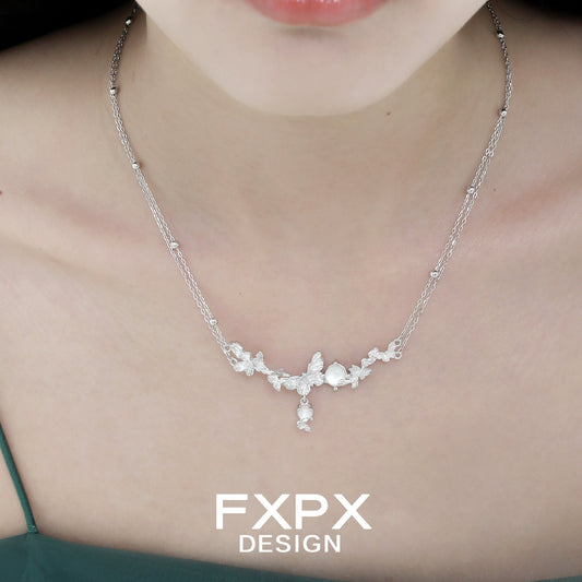 Elegant FXPX butterfly necklace for women featuring a delicate floral design and shimmering details