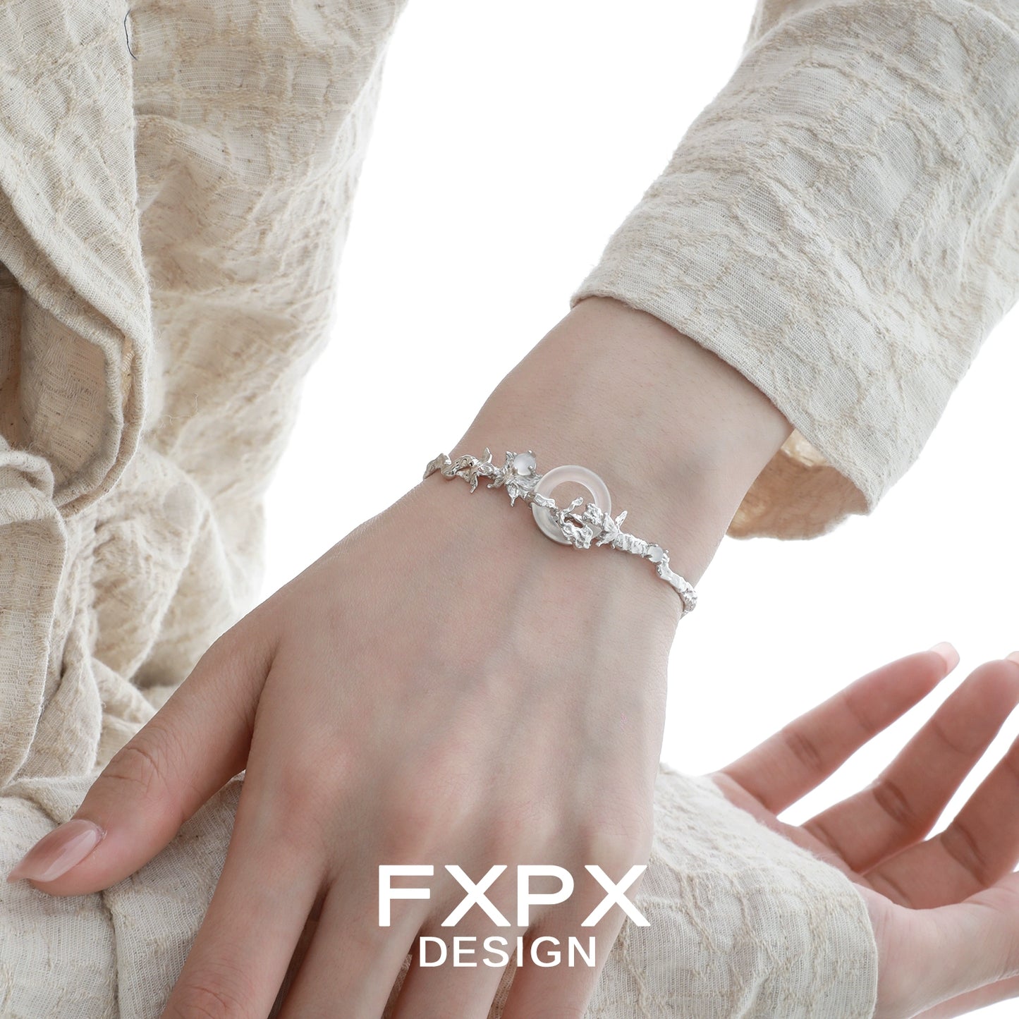 FXPX butterfly sigil bracelet featuring a delicate design with clear accents and adjustable fit