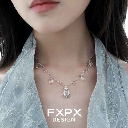 Stylish butterfly water drop silver necklace featuring delicate charms and a shimmering design