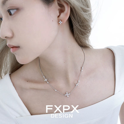 Elegant FXPX cross necklace for women featuring delicate floral accents and matching earrings