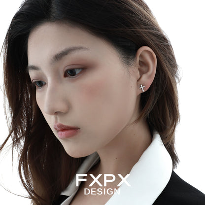 Elegant FXPX cross zircon earrings displayed on a model showcasing their stylish design