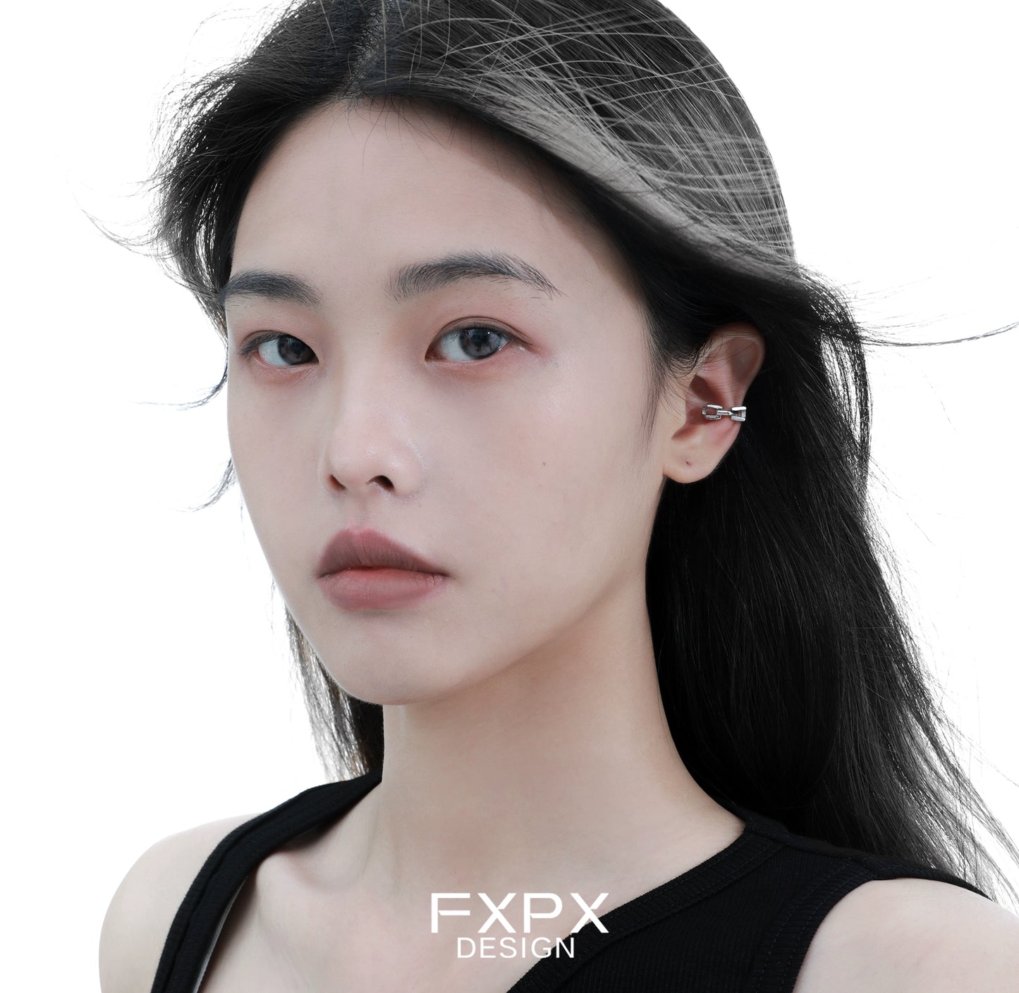 Stunning FXPX cyber mech silver earrings showcased on a model with stylish hair