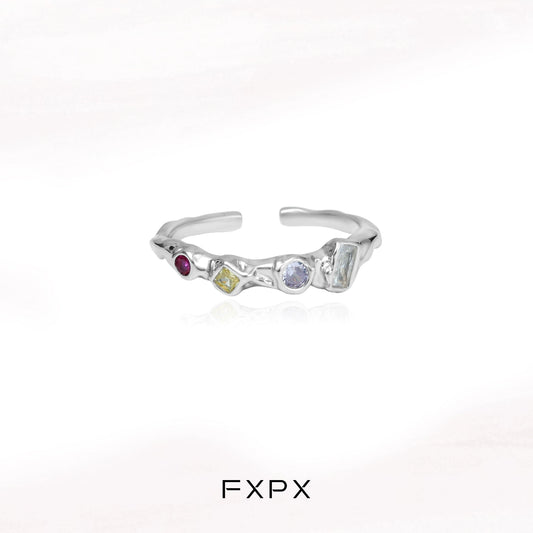 FXPX dopamine colored zircon ring with unique gemstone arrangement and modern design