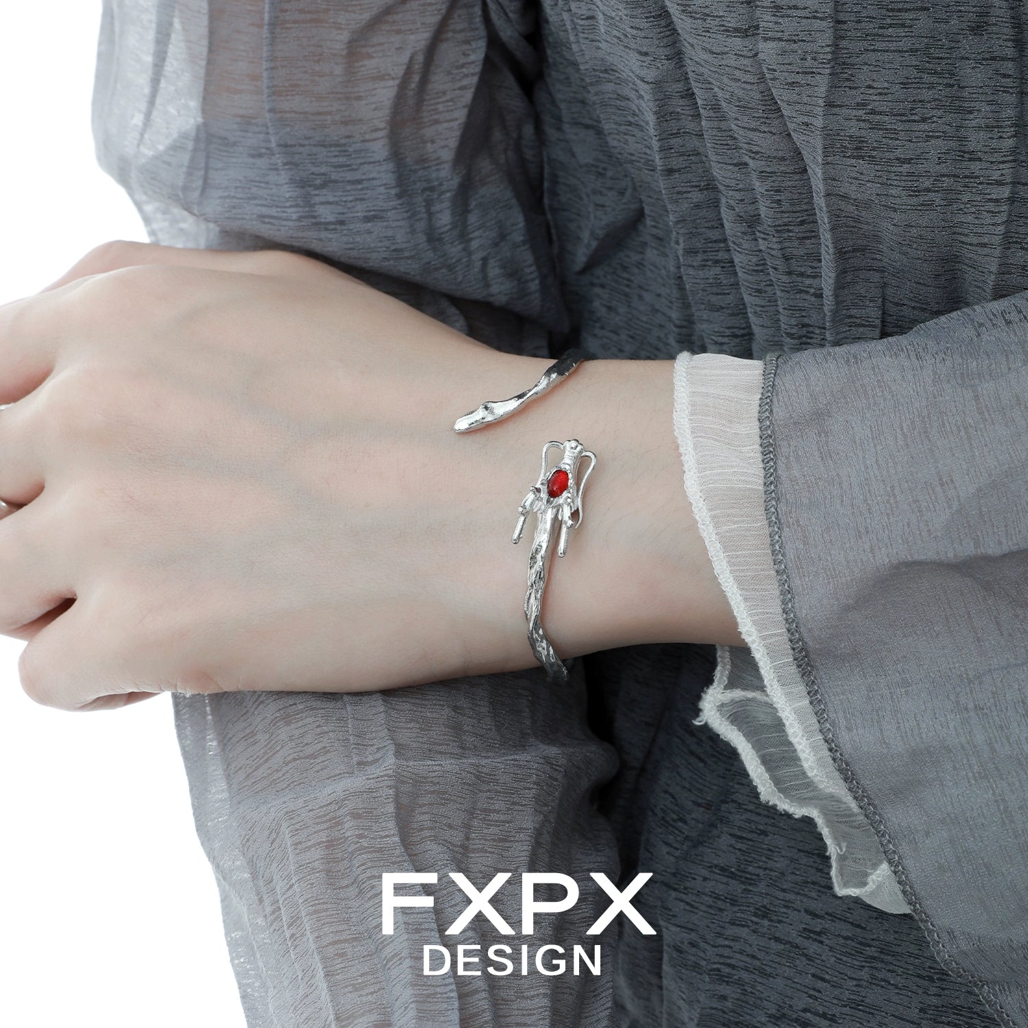 Stylish FXPX dragon guardian silver bracelet featuring a red gemstone detail